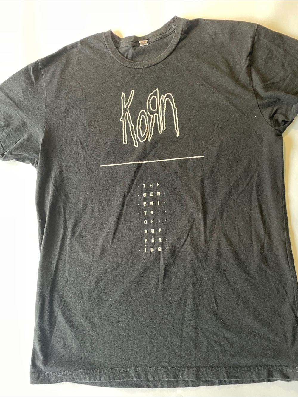 Next Level Apparel Black Korn Graphic Tee with White Print